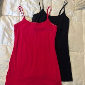 Two tank tops, magenta side of red and basic black.